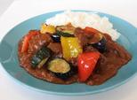 猪肉と季節野菜のスパイシーカレーの写真
